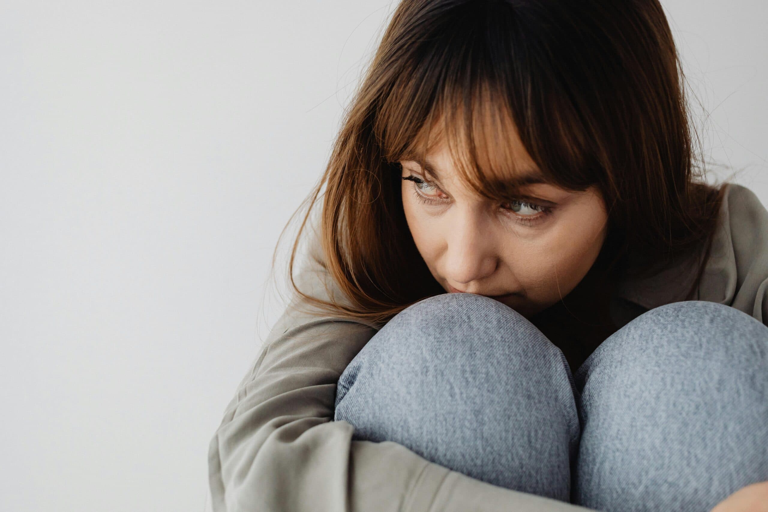 Person experiencing symptoms of anxiety in a moment of tension or worry